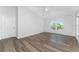 Bright bedroom with large window and vinyl flooring at 4199 Hollis Ave, Port Charlotte, FL 33953
