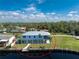 Aerial view of a canal-front home with an open floor plan and private backyard at 4199 Hollis Ave, Port Charlotte, FL 33953