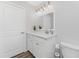 Bathroom with white vanity, quartz countertop, and a stylish mirror at 4199 Hollis Ave, Port Charlotte, FL 33953