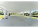 Expansive covered patio area, offering shade and outdoor space at 4199 Hollis Ave, Port Charlotte, FL 33953