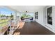 Relaxing outdoor deck with seating area and water views at 4199 Hollis Ave, Port Charlotte, FL 33953