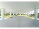 Expansive covered patio area, offering shade and outdoor space at 4199 Hollis Ave, Port Charlotte, FL 33953
