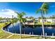 Waterfront property with canal access and lush landscaping at 4199 Hollis Ave, Port Charlotte, FL 33953