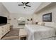 Large main bedroom with king-size bed and plenty of natural light at 13511 Foresman Blvd, Port Charlotte, FL 33981