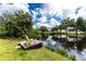 Private dock on the canal, perfect for fishing and enjoying the waterfront views at 13511 Foresman Blvd, Port Charlotte, FL 33981