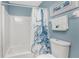 Bathroom with octopus shower curtain and tub at 13511 Foresman Blvd, Port Charlotte, FL 33981