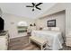 Spacious main bedroom with ample closet space and wood-look flooring at 13511 Foresman Blvd, Port Charlotte, FL 33981