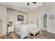 King-size bedroom with en-suite bathroom and large window at 13511 Foresman Blvd, Port Charlotte, FL 33981