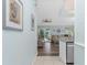 Open living area with view to the pool and lanai at 13511 Foresman Blvd, Port Charlotte, FL 33981