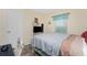 Bedroom with a queen bed and TV at 13511 Foresman Blvd, Port Charlotte, FL 33981