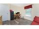 Home office with wood-look floors and built in desk at 13511 Foresman Blvd, Port Charlotte, FL 33981