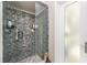 Modern bathroom with a walk-in shower and glass enclosure at 13511 Foresman Blvd, Port Charlotte, FL 33981