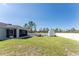 Large backyard with screened patio and shed at 13172 Gorman Ave, Port Charlotte, FL 33981