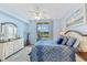 Main bedroom with balcony access and golf course view at 10055 Links Ln # 206, Rotonda West, FL 33947
