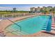 Relaxing pool area with canal view and plenty of sun at 10055 Links Ln # 206, Rotonda West, FL 33947