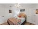Cozy bedroom featuring a comfortable bed and built-in shelving at 2555 Dixon Ter, Port Charlotte, FL 33981