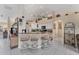 Open kitchen with granite countertops and white cabinets at 2555 Dixon Ter, Port Charlotte, FL 33981