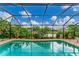 Enjoy the view from this relaxing screened pool area at 2555 Dixon Ter, Port Charlotte, FL 33981