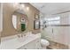 Modern bathroom with a walk-in shower and updated vanity at 2555 Dixon Ter, Port Charlotte, FL 33981