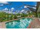 Inviting screened-in pool with water views at 2555 Dixon Ter, Port Charlotte, FL 33981