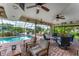 Inviting pool area with covered patio and seating at 2555 Dixon Ter, Port Charlotte, FL 33981