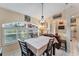 Bright dining room with window seat and plenty of natural light at 2555 Dixon Ter, Port Charlotte, FL 33981