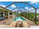 Screened pool and patio offer ample space for relaxation at 2555 Dixon Ter, Port Charlotte, FL 33981