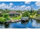 Aerial view of a single Gathering home with a private dock and pool at 2555 Dixon Ter, Port Charlotte, FL 33981