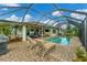 Large pool and patio with plenty of seating and lounging space at 2555 Dixon Ter, Port Charlotte, FL 33981