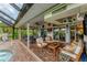 Covered patio with pool access and comfortable seating at 2555 Dixon Ter, Port Charlotte, FL 33981