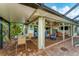 Patio with outdoor dining and relaxing pool views at 2555 Dixon Ter, Port Charlotte, FL 33981