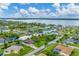 Aerial view showing home's location on a canal with neighboring houses at 2555 Dixon Ter, Port Charlotte, FL 33981
