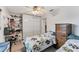 Well-lit bedroom with twin beds and a spacious closet at 2555 Dixon Ter, Port Charlotte, FL 33981