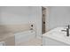 Modern bathroom with a double vanity, shower stall, and separate soaking tub at 220 Mark Twain Ln, Rotonda West, FL 33947