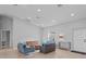 Spacious living room has a large window and an open floor plan with plenty of natural light at 220 Mark Twain Ln, Rotonda West, FL 33947
