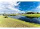 Aerial view of property with canal and neighborhood at 240 White Marsh Ln, Rotonda West, FL 33947