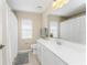 Clean bathroom with white vanity and shower/tub combo at 240 White Marsh Ln, Rotonda West, FL 33947