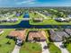 Aerial view of single-Gathering home and neighborhood at 240 White Marsh Ln, Rotonda West, FL 33947