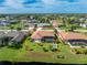 Aerial view of house with pool and landscaped backyard at 240 White Marsh Ln, Rotonda West, FL 33947
