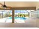 Inviting screened pool area with covered patio at 240 White Marsh Ln, Rotonda West, FL 33947