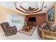 Relaxing living room with a view of the pool and patio at 240 White Marsh Ln, Rotonda West, FL 33947
