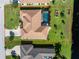 Aerial view showcasing the house, pool, and yard at 240 White Marsh Ln, Rotonda West, FL 33947