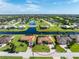 Aerial view of house, neighborhood, and canal at 240 White Marsh Ln, Rotonda West, FL 33947