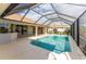 Large screened pool with open patio and great view at 240 White Marsh Ln, Rotonda West, FL 33947