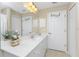 Bright bathroom with double vanity and lots of storage at 240 White Marsh Ln, Rotonda West, FL 33947