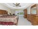 Spacious bedroom with king-size bed and access to the backyard pool at 240 White Marsh Ln, Rotonda West, FL 33947