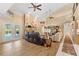 Vaulted ceiling living room with stone fireplace at 61 Pinehurst Pl, Rotonda West, FL 33947