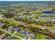 Aerial view of the property and surrounding neighborhood at 61 Pinehurst Pl, Rotonda West, FL 33947