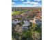 Bird's eye view of multiple homes showcasing community layout and mature trees at 29 St John Blvd, Englewood, FL 34223