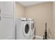 Laundry room with Samsung washer and dryer, and additional storage at 14194 Wenzel Ave, Port Charlotte, FL 33981